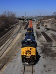 The IAIS 502 & 156 depart the EJ&E Joliet Yard after picking up 15 EJ&E covered coil cars, on each side you can see all the track changes that CN is making to the yard