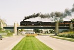 This is the shot of them going over  Mormon Trek - bwith the steamer and 702 positioned perfectly in the shadow cast by the plume of smoke.