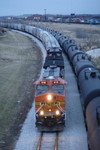 BNSF G-RCISMR departs from the new siding at Silvis, IL and heads for the BNSF mainline at Colona.  16-Dec-2006.