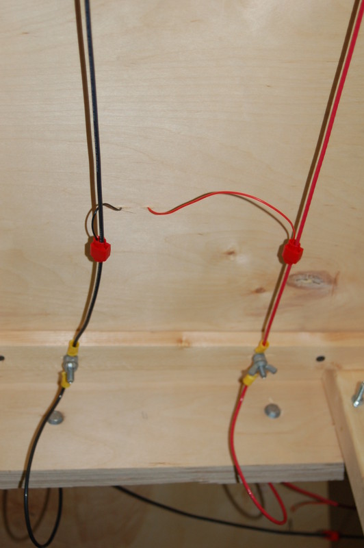 Even the wiring is sectional.  The busses are 12 gauge stranded wire running to homemade terminal strips.  Small 6 inch runs are connected with wing nuts to join together the dominoes.  Wiring was speeded along with the use of 3M Suitcase Connectors to eliminate soldering under the layout.