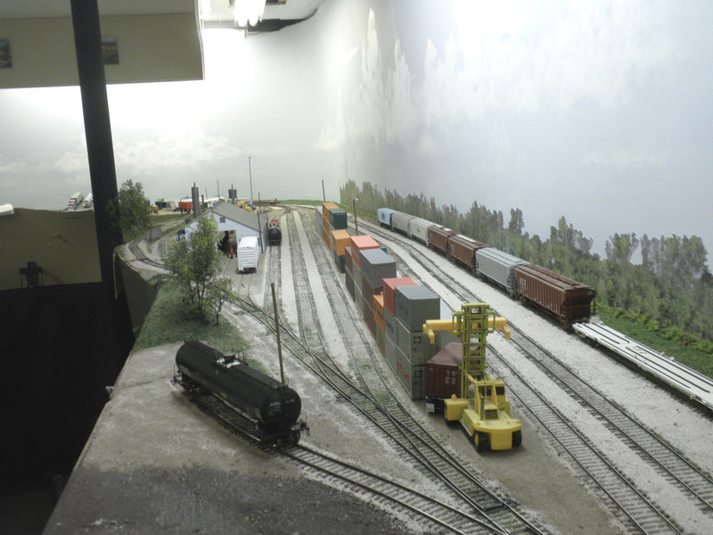 Looking south (timetable east) at Bluffs yard. On the far right is the old main, now used as the BNSF interchange track on the west end and for intermodal storage on the east end. To the left of the old main is 1 track, 2 track (used for UP pigs), a condensed version of the ramp, 10 track (IAIS pigs), 11 and 12 tracks (manifest), the rip track, and the engine facility.