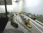 Looking south (timetable east) at Bluffs yard. On the far right is the old main, now used as the BNSF interchange track on the west end and for intermodal storage on the east end. To the left of the old main is 1 track, 2 track (used for UP pigs), a condensed version of the ramp, 10 track (IAIS pigs), 11 and 12 tracks (manifest), the rip track, and the engine facility.