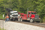 Monson Towing pulling the boom truck off to the side.