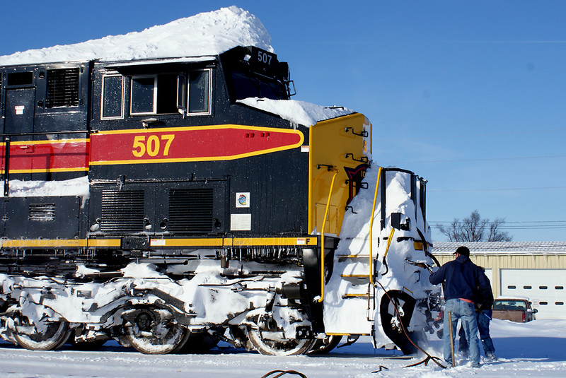 Cleaning snow from the front coupler