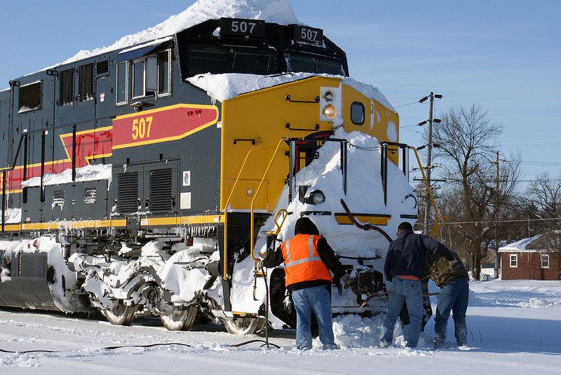 Cleaning snow from the front coupler