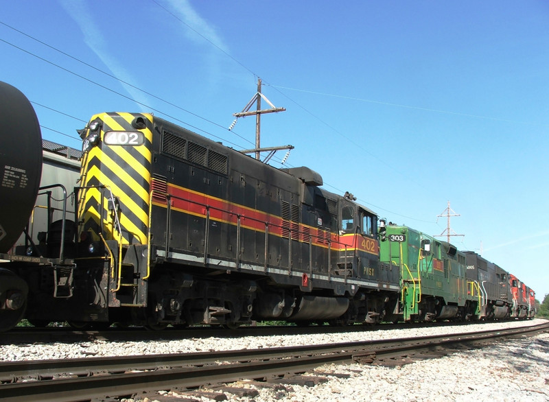 PWSX 402 and 303 trail an IC SD40-2 and 2 ex IC SD40-2's into CN/IC's Hawthorne Yd., Cicero, IL