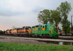 Just after a heavy rain, 303 prepares to lead 468, 603, 403, and 400 on a very long BICB-13 out of Blue Island, IL A lash-up that is very much missed on the IAIS system. 05/13/04