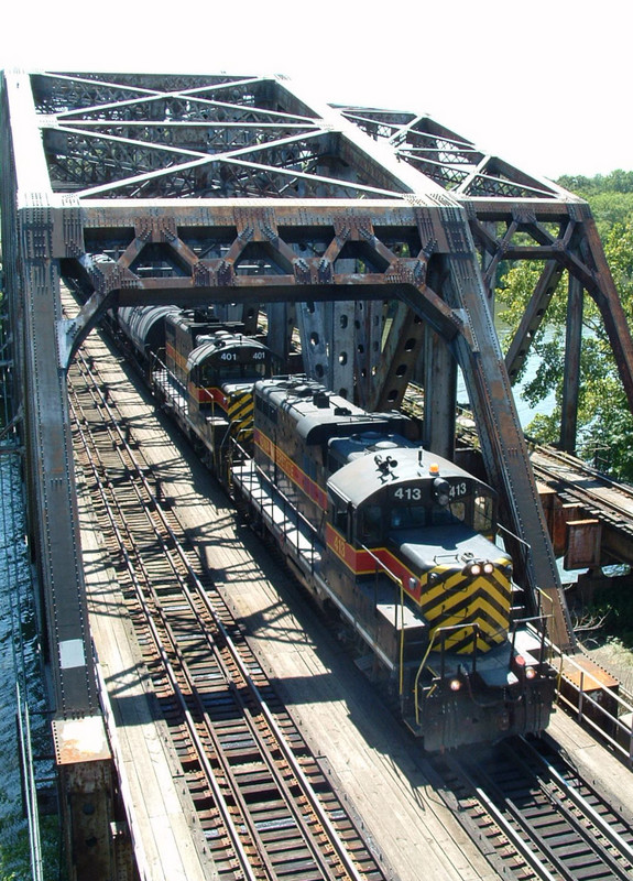 IAIS 413 leads 401 elephant style on a lengthy CBBI over the Cal Sag Channel in Blue Island, IL 08/06/04