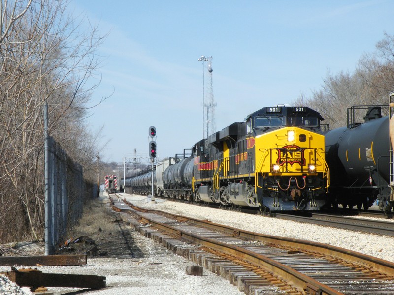 The RINSU is about clear of CSX's Bridge 407 and the two GE's begin throttling up for the climb out of the river valley.  The manifest to the right is BICB from the previous night.