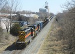 Cruising through Minooka, SD38-2 154 leads GEVO 507 on a lengthy BICB from the previous night. Due to maintenance on the CSX over night, the Iowa rescheduled their movements over the weekend during daylight. This occured for two or three weekends.