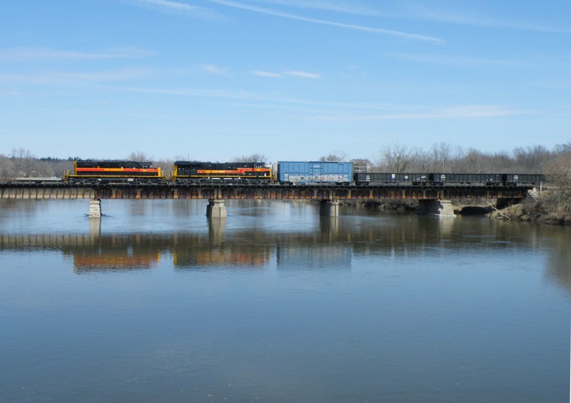 Just hitting the Ottawa Yar Limits, Iowa 154 tip toes across the Fox River in a rare daylight scene.