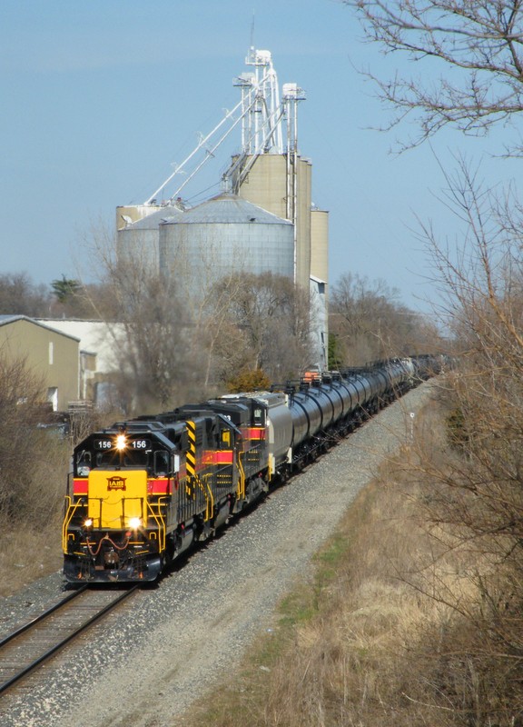 The shot of the day, IAIS SD38-2 156 leads a BIRI ethanol train west through Minooka with a nice "one of each" consist. Thankfully, the engineer was an EMD fan and knew people would be out gicing chase, so he isolated the GE prior to departing Burr Oak Yd.