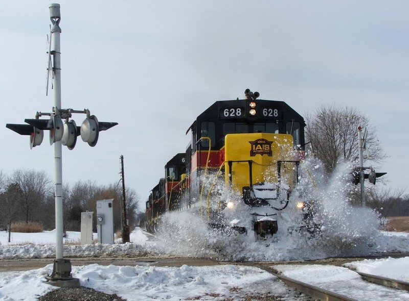 628 smacks a mini snow pile at a recently plowed grade crossing coming into Homestead.