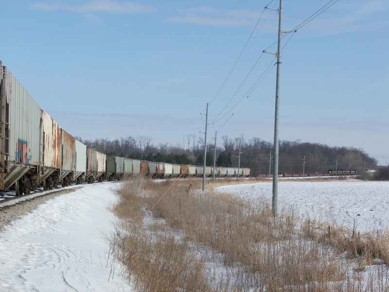 CBBI rolling up hill and around a curve into Hawkeye.