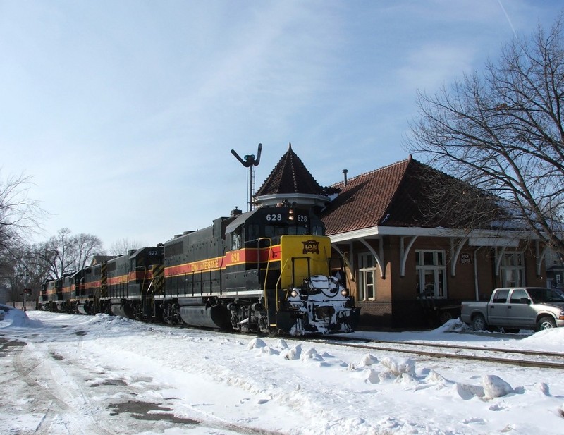 Iowa 628 east passing the old RI Iowa City Depot.