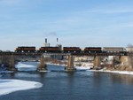 ICCR departs westbound with 703, 153, 701, and 711 over the Iowa River bridge