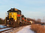 Iowa 403 west sprints down hill and around a scenic curve just west of Hawkeye in the last minutes of sunlight.