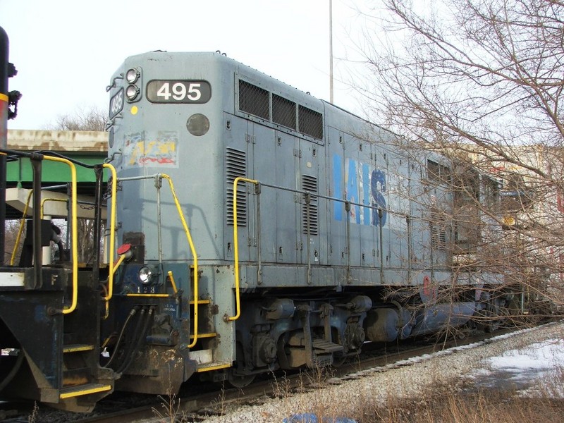 The seaboard logo coming through the grey paint on the back of Iowa 495.