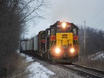 Well after the sun got hit with cloud cover, Iowa 601 heads west with BICB-18 in tow, west of Marengo.