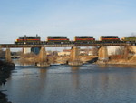 CR job on the Iowa River bridge, Nov. 20, 2006.  Crandic's IC yard is under the span the rear unit is on.