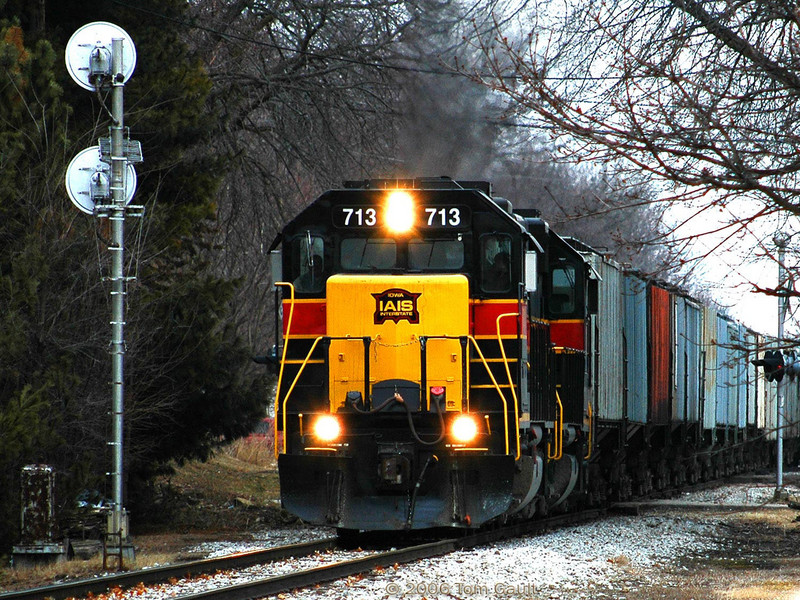 IAIS 713 West approaches the Rock Island signal protecting the Grinnell diamond after meeting the eastbound train on March 6, 2006.  Photo by Tom Gault