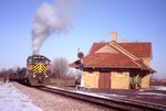 IAIS 402 smokes it up on ICSW-11 as it switches cars on the siding at West Liberty, IA on 11-Feb-2004.  Photo by Erik Rasmussen