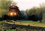 IAIS engineer Tom Frances pilots Soo 220/228 train over Arsenal Island on April 26, 1993, when Soo Line trains detoured over IAIS between Missouri Division Junction in Davenport, IA and Rock Island, IL during the Flood of 1993. Todd Pendleton #1.