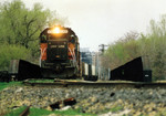 IAIS engineer Tom Frances pilots a Soo Line train over Arsenal Island on April 27, 1993, when Soo Line trains detoured over IAIS between Missouri Division Junction in Davenport, IA and Rock Island, IL during the Flood of 1993. Todd Pendleton #2.