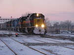 IAIS 151 heads east on the BNSF as it crosses its own railroad at Joliet, IL on 01/03/2008.  Joe Kaminskas #1.