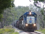 UP 3300 leads a westbound at County Hwy M16 west of Hancock, IA on 06/21/2006.  Joe Atkinson #2.