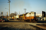 481 and 625 tow a combined BICB and RIIC east up the "Golden State Route" after detouring over the Crescent Bridge.  Davenport, IA.  Erik Rasmussen #1.
