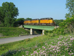 UP 3032 heads west over US Rte 6 east of Council Bluffs, IA.  Andy Brown #1.