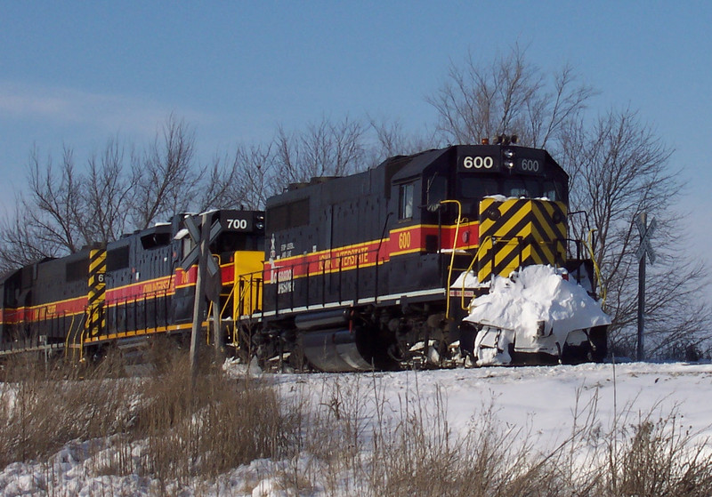 600 leads three engines southeast on the Prairie City Branch on 1/8/2005 to pick up a grain train.  Photo by Ben Hicks.