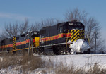 600 leads three engines southeast on the Prairie City Branch on 1/8/2005 to pick up a grain train.  Photo by Ben Hicks.