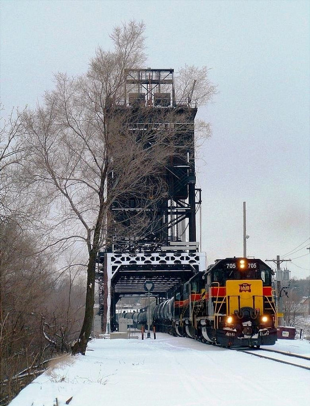 IAIS 705 leads CBBI-07 through Bridge 407 transferring from CSXT to METX owned track. Joliet, IL, January 9th, 2005.  Photo by Chris Lastovich.