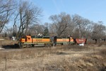 At Colona, our coal empty gets delayed again, as a northbound BNSF comes through the Colona interlocking.  In the lead are BNSF SD40-2s 6786 and 6854.