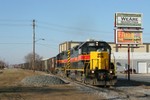 With the BNSF job and an accompanying hyrail off the track, 707 and empty head on east out of the yard.