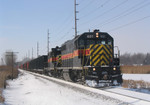 IAIS 601 East on CRPE-27 prepares to cross IL Hwy 5 in East Moline on 27-Jan-2004.