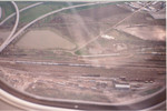 Bluffs yard, April 1995.  The turntable is at the lower left, enginehouse lower right.  At the far left you can see where the old TOFC ramp track diverged.  About two years after this photo, nearly all the tracks between the pig flats in the center of the yard and the string of grey covered hoppers further back were removed to make way for the intermodal ramp.