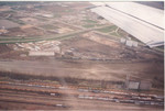 A little further north (timetable west) in Bluffs yard - the lower tracks in this photo.  Those closer to the grey Hansen-Mueller elevator are in what is now IAIS' (ex-CBGR, xx-MILW) West Yard.  About halfway between the grey and white elevators is the ex-Wabash facility, now IAIS' Lower Yard.