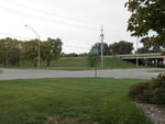 To the southwest is the site of the yet-to-be-built former RI depot, the intersection of 16th Ave. and S. 6th St., and the South Expressway overpass.  Prototype, October 20, 2013.