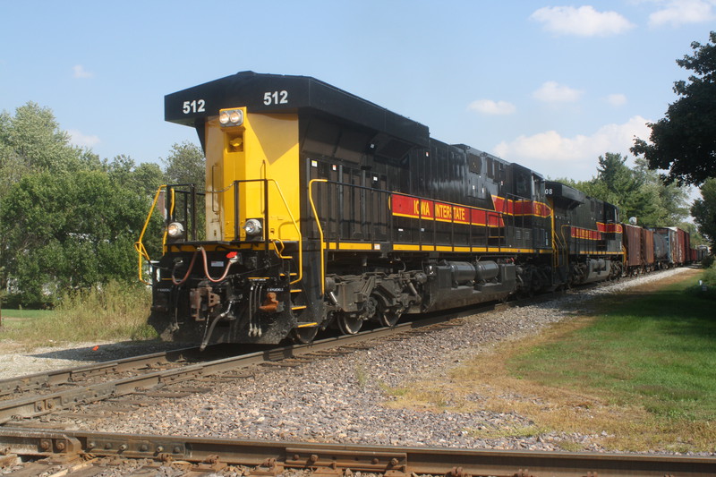 BICB runs long hood forward at Grinnell, IA on 9-21-10 about to cross the UP diamond.