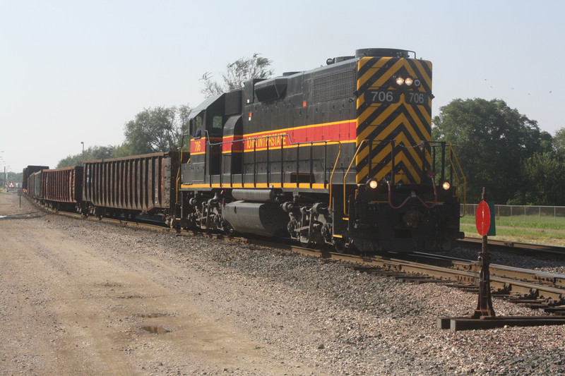 The Newton to Des Moines Area Tramp Job heads back towards Newton at Short Line Yard on 9-21-10. An EB BNSF Detour is seen in the distance.