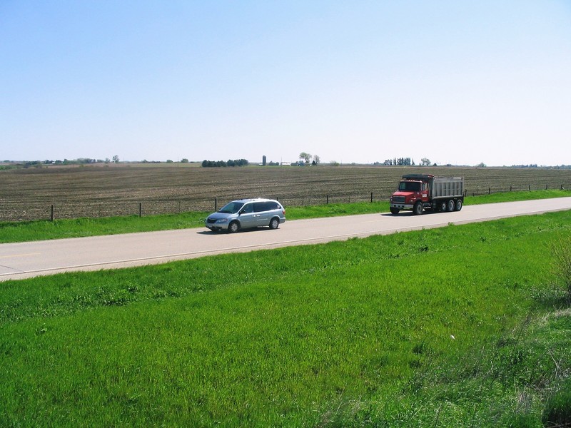 My Uncle Steve Kroeger in his van as he chases us along the White Pole Road between Stuart and Menlo