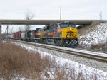 East train pulls under the Wilton overpass on the siding at N. Star.