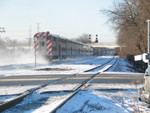 Outbound Metra approaches the old RI searchlights at Robbins, looking west from 139th St.