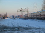 Suburban trains meet under the new signal bridge at Gresham, Dec. 15, 2010.