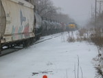 Westbound turn pulls into the siding at First Ave. while the east train waits for them to clear.