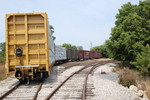 Boxcars and Centerbeams waiting shipment