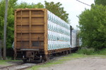 Centerbeam lumber cars spotted over the diamond